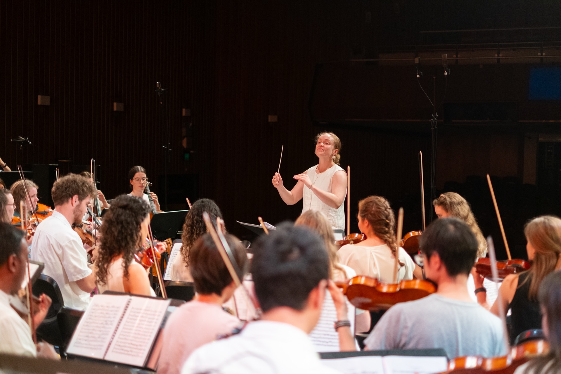 Australian Christian Arts orchestra members and ensemble community rehearsing in Sydney, representing the charity's governance and transparency commitment