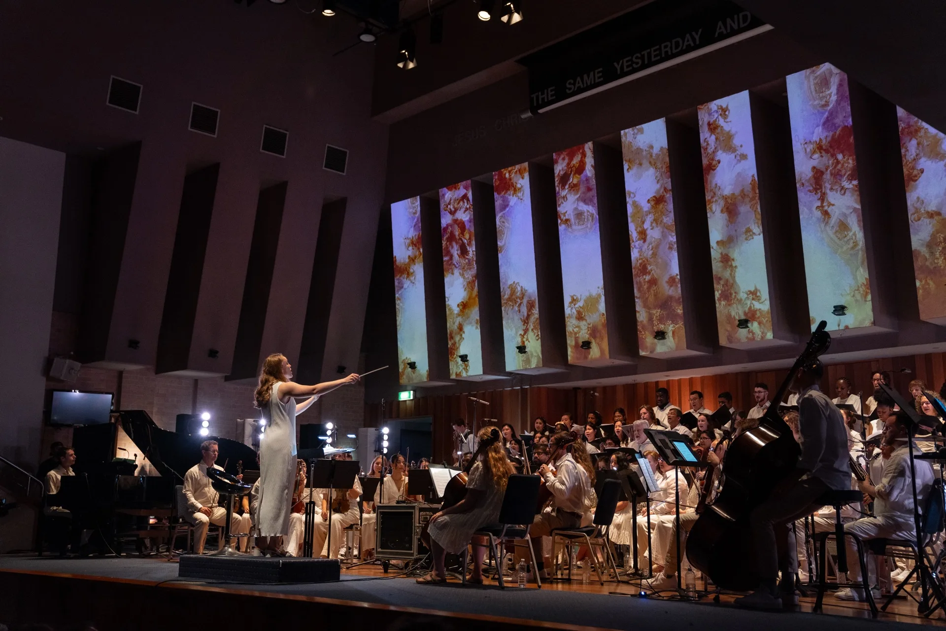 Full orchestra and choir on stage for Messiah performance, Sydney venue