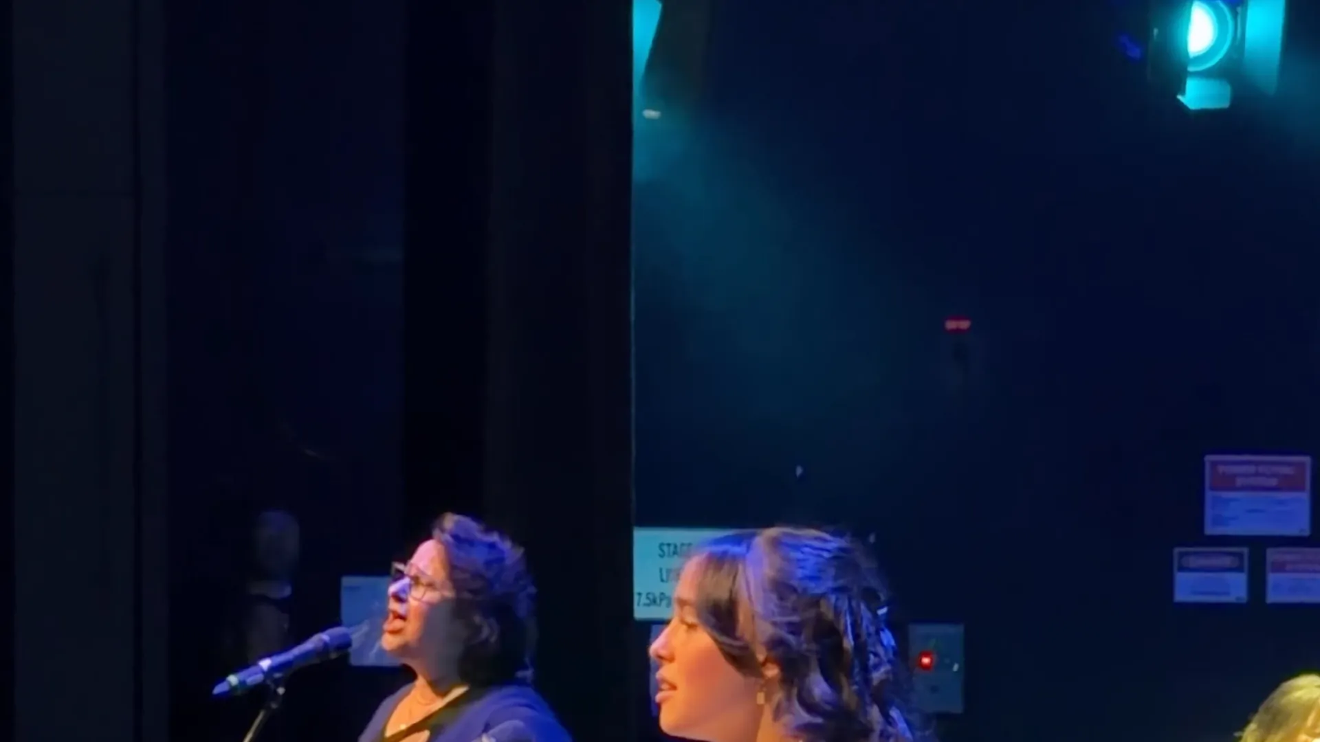 Two young vocalists singing at the Australian Christian Proms