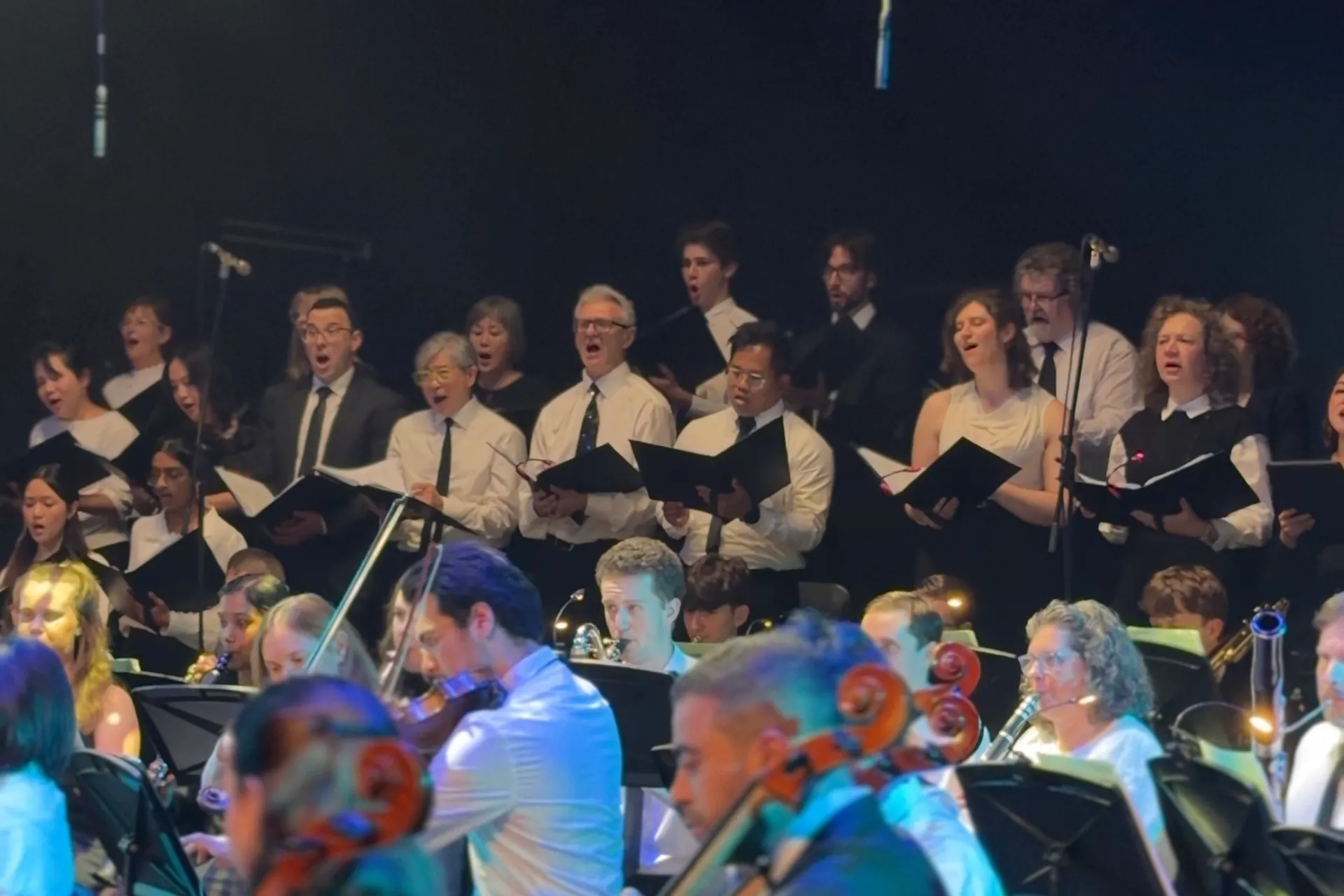 Choir and orchestra performing together at the Australian Christian Proms