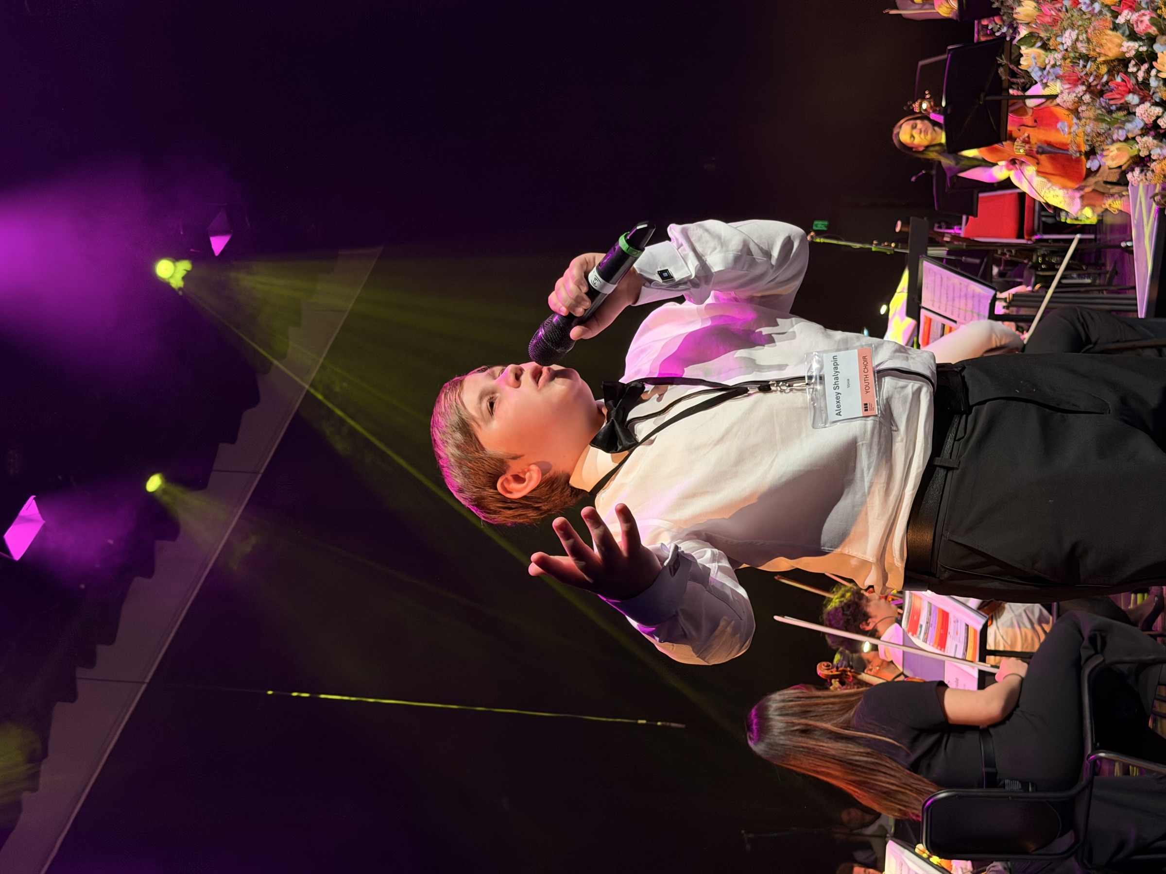 A youth vocal soloist in full voice at the Australian Christian Proms, Sydney.